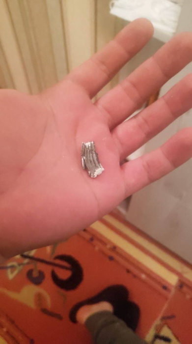 Осколок кассетного снаряда попал в квартиру в Николаеве - фото: t.me/energoatom_ua