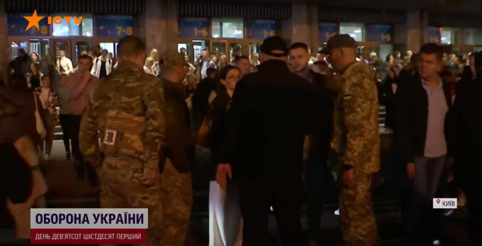 Кадр с проверкой возле Дворца спорта, скриншот из Национального телемарафона
