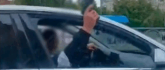 В Киеве мужчины устроили стрельбу из окна авто